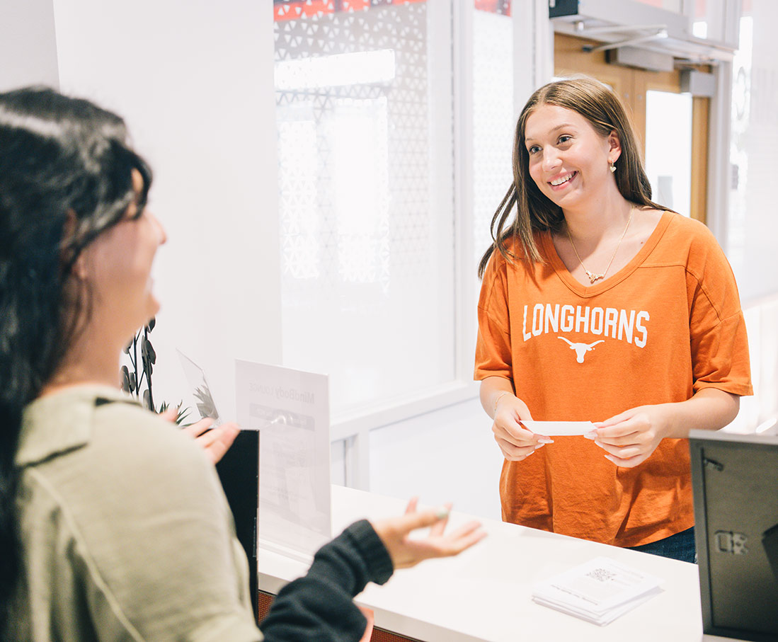 student talking to counselor