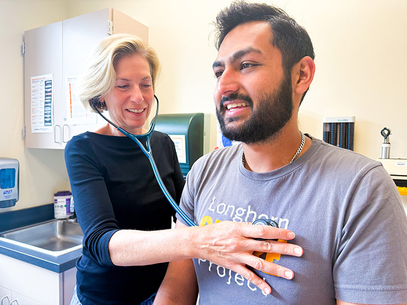 Dr. Glade with a patient