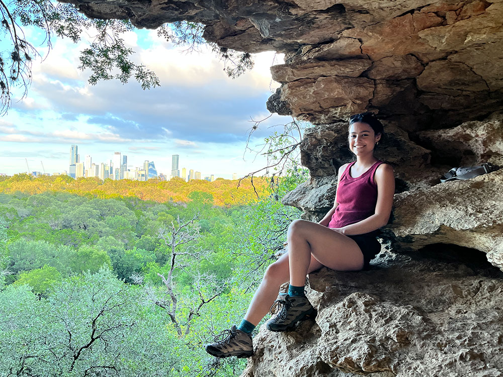 Chicas enjoys the view overlooking Austin during a hike.